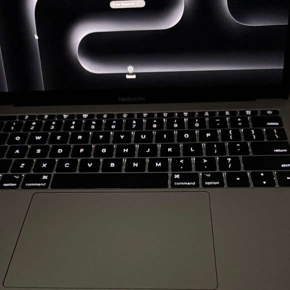 Apple Silver MacBook Pro with Backlit Keyboard and Touchpad
